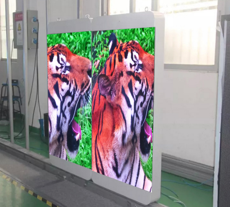 There is two tigers is light pole figure display picture