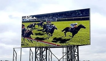 An Outdoor LED Display Shows Horse Racing