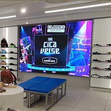 An Indoor LED Advertising Display Installed In A Shoe Store