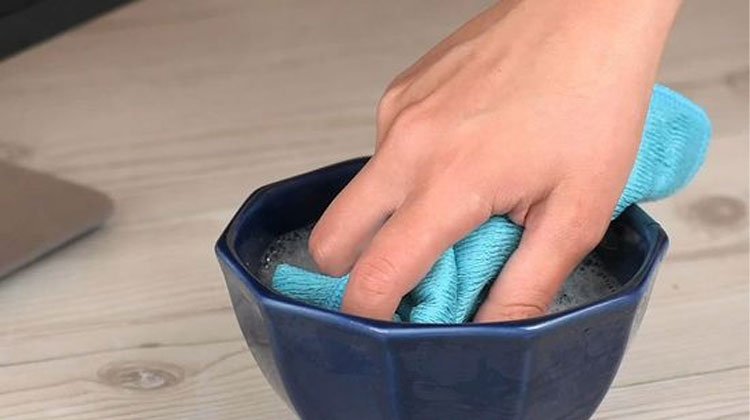Microfiber Cloth Dipped In Cleaner